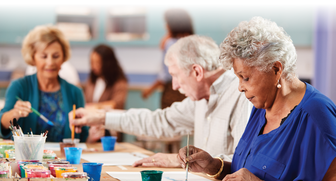 Group Of Retired Seniors Attending Art Workshop